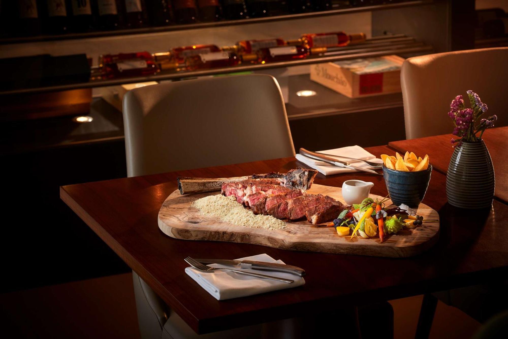 Tivoli Carvoeiro Hotel Carvoeiro  Ngoại thất bức ảnh A steak at the restaurant